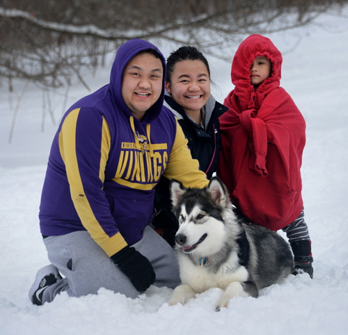 Dog parks have become social affairs for many families across the Twin Cities who bond with other dog owners while their pets frolic, including this family at Battle Creek Regional Park in Saint Paul.