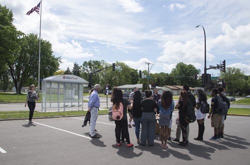A group of Brooklyn Center high school students adopted a new bus shelter near their school.