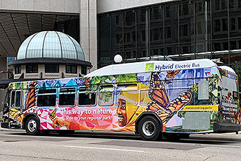 Metro Transit bus with nature photos on the side.