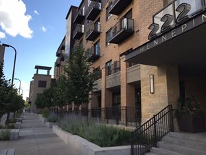 Downtown Minneapolis. Development that supports transit service varies from moderate to high densities.This market-rate project is 112 dwelling units per acre.