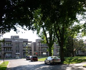 St. Louis Park, Wooddale Flats. This moderate density residential development on Wooddale Avenue near Excelsior Boulevard adds density but at a scale that respects the adjoining single-family neighborhood.