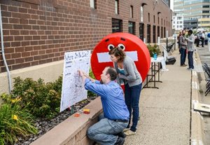 Commuter Services event to promote alternatives to driving alone, featuring “Where Do You Live?” poster.