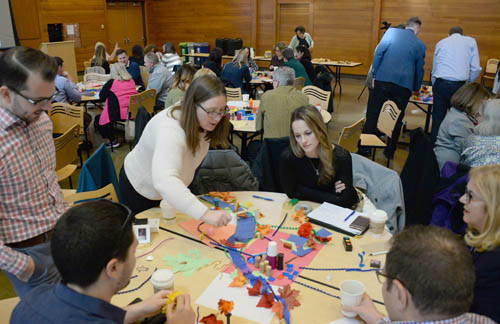 Local planners engage in a creative exercise at a Council-sponsored workshop on community engagement.