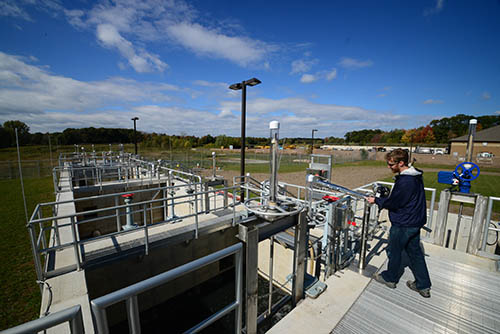 A worker at a wastewater treatment plant.