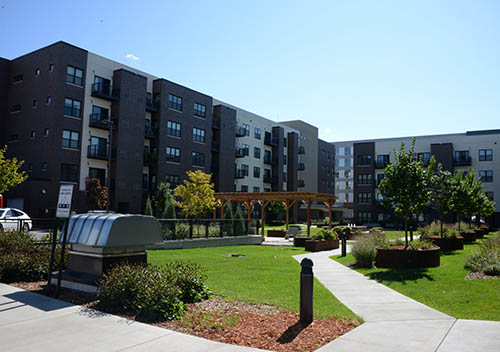 Multi-story building with a courtyard.