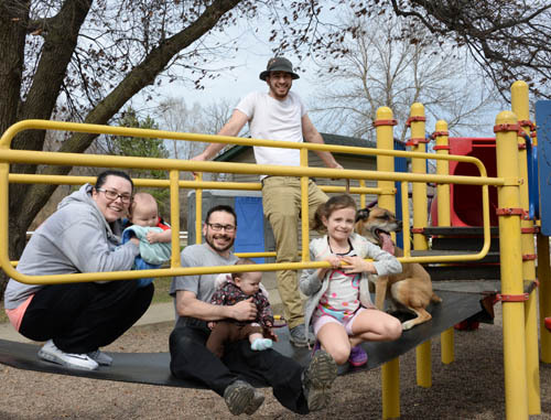 Peter Rosen (second left) and his family enjoy a sunny spring day at Connemara Park in Rosemount. The park is just around the corner from his home and draws visitors from several neighborhoods near the west side city line.