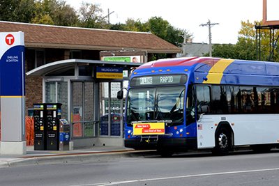 A Metro A Line bus at a transit stop.