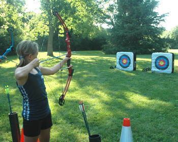 girl aiming at target.