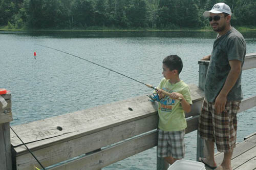 Father and son fishing at Lebanon Hills Regional Park in Dakota County.
