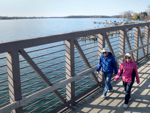 Fred and Lois Parduhn of Excelsior enjoyed a view of Lake Minnetonka’s Excelsior Bay while walking on the Minnetonka LRT Regional Trail recently. The 15-mile-long trail traverses lakes, woods, meadows, neighborhoods and several towns south of the big lake.