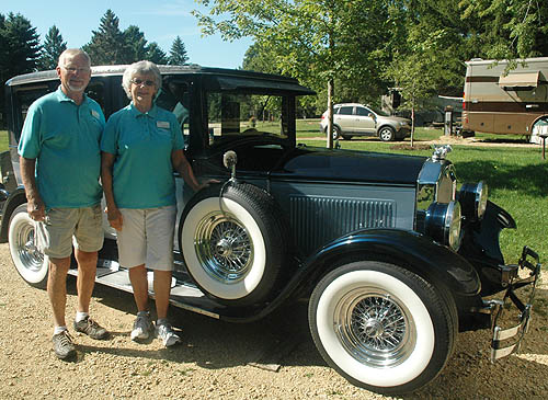 Longheinrichs with their vintage car.