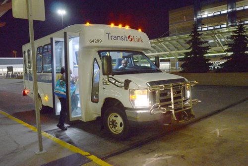 Small buses bring late and early shift workers to the airport from Saint Paul and suburbs.