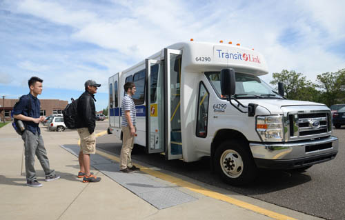 Passengers boarding Transit Link vehicle. Base fares for Transit Link (dial-a-ride service for areas of the region not served by fixed-route transit)  would increase either $1.25 or $1.50 for off-peak fares and $2.25 or $2.75 for peak fares if the Council approves a fare increase.