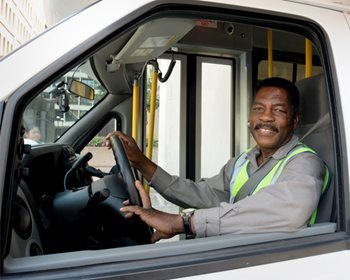 Metro Mobility driver in a bus.