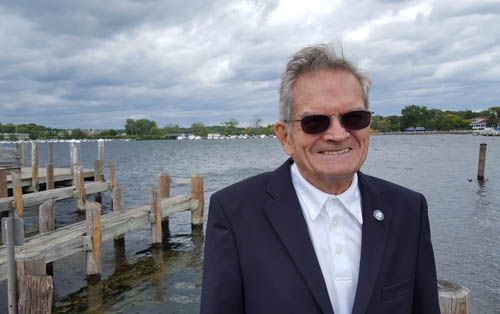 Russ Susag on a pier on Excelsior Bay, Lake Minnetonka.