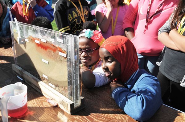 Girls viewing display at the Children's Water Festival.