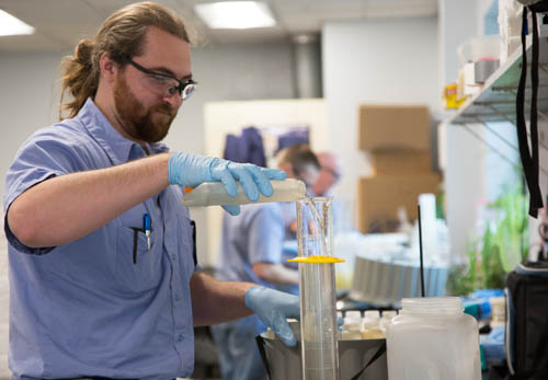 Council employee Nick Alverson tests an industrial wastewater sample from one of the Council’s industrial customers.