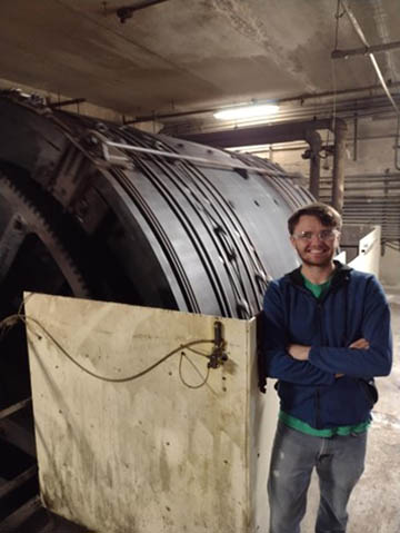 An intern stands on the factory floor at Twin City Tanning.