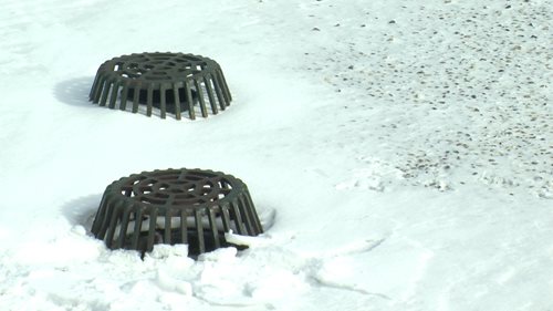 Drains on the roof of the rail facility will help convey water to the cistern inside the building.