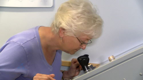 Panelist sniffing samples at the olfactometer.