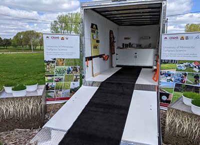 A trailer with educational materials inside and outside.