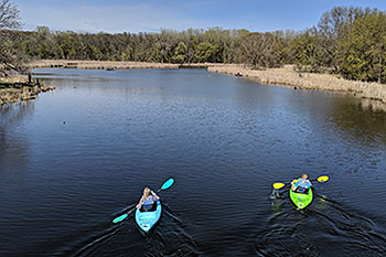 Two people kayaking.