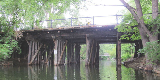 Existing wooden railroad bridge