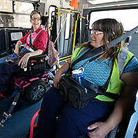 Two riders in wheelchairs.