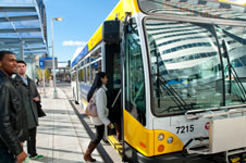 People boarding a bus.