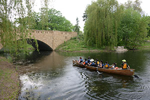 Large canoe in the water at Phalen-Keller Regional Park.