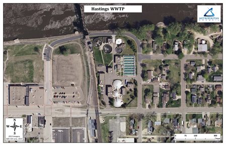 Aerial color photo of the Hastings Wastewater Treatment Plant with the Mississippi River at the top of the photo.