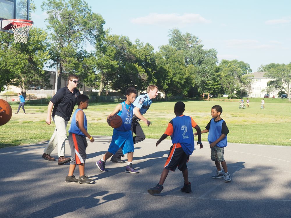 <div class='lb-heading'>Basketball in the Park with the Police</div><div class='lb-text'>In St. Louis Park, the local police department hosts weekly basketball games in Anisworth Park. This event serves as an opportunity to bring together community members and help build relationships with the local police.</div>