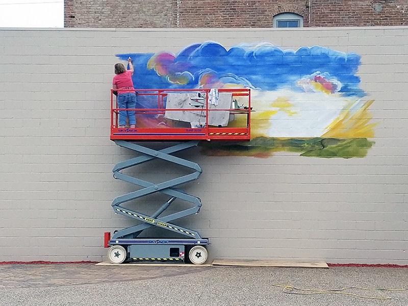 <div class='lb-heading'>Local Mural in Downtown Plaza (2)</div><div class='lb-text'>The City of Belle Plaine commissioned local muralist, Lana Beck, to paint a mural at its Downtown Plaza. The mural demonstrates the City’s commitment to leveraging its creative, entrepreneurial culture to foster economic prosperity and community wellbeing. The mural, titled “Kindness Rewards”, was completed in Summer 2018. </div>
