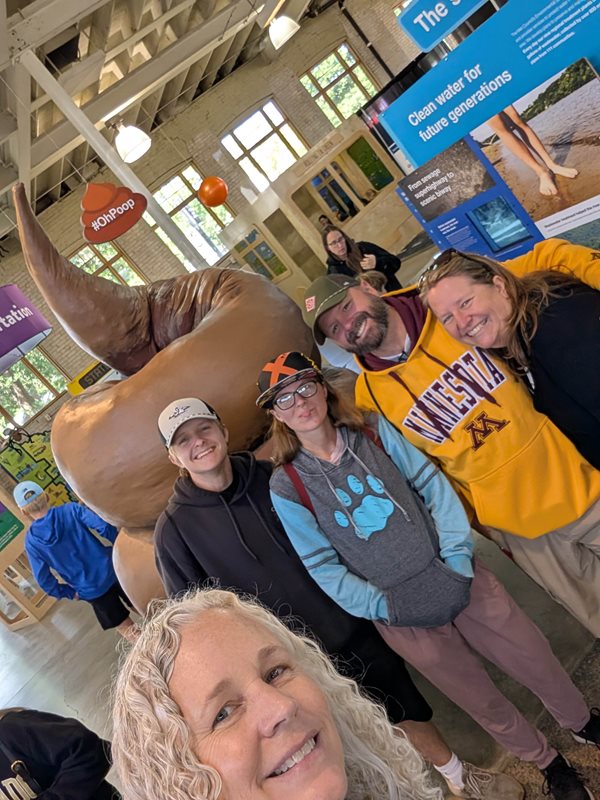 The poop pile is almost as popular at the fair as the crop art. OK, well, maybe not THAT popular. Family and friends take a selfie in the Oh poop! exhibit.