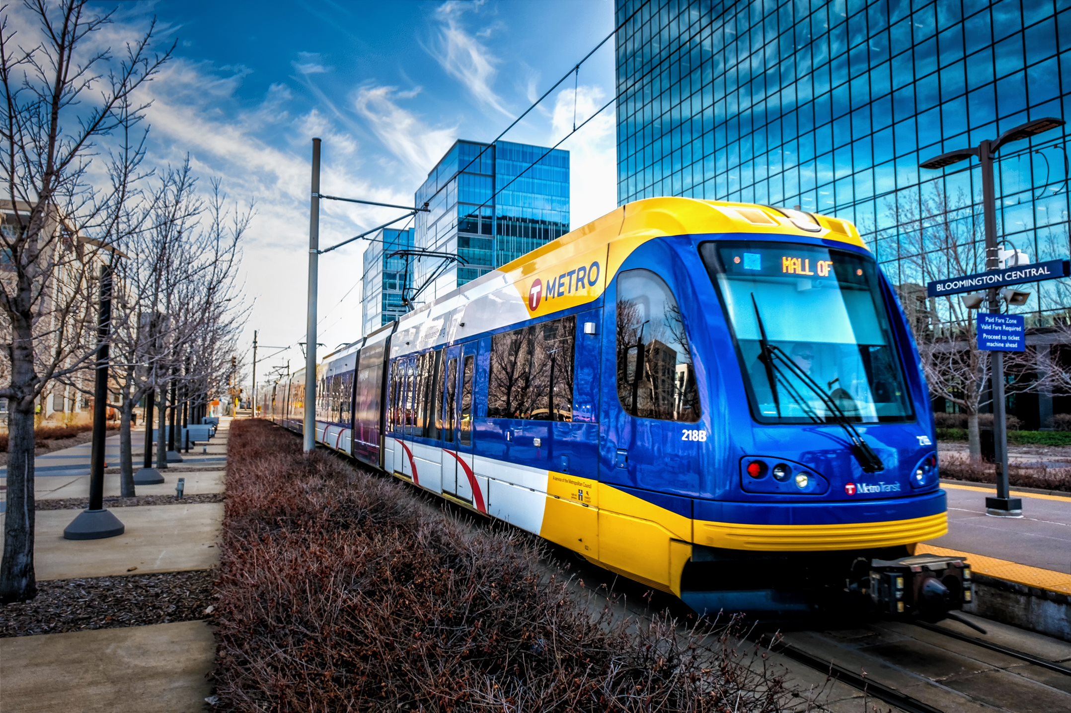 A Metro Blue Line passes through Bloomington Central