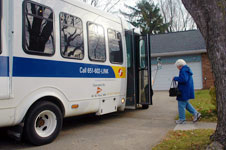 People getting on bus