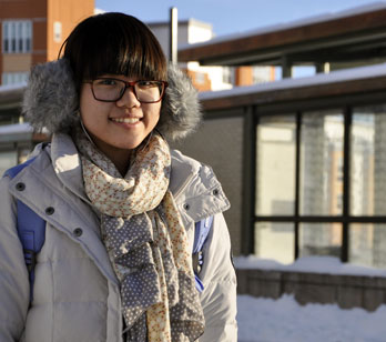 Girl in fornt of bus stop