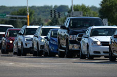 A row of cars on the road