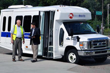 People getting on bus